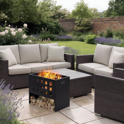 Rectangular grid steel fire pit with flames and log storage in garden seating area - outdoor lifestyle - Pyrova
