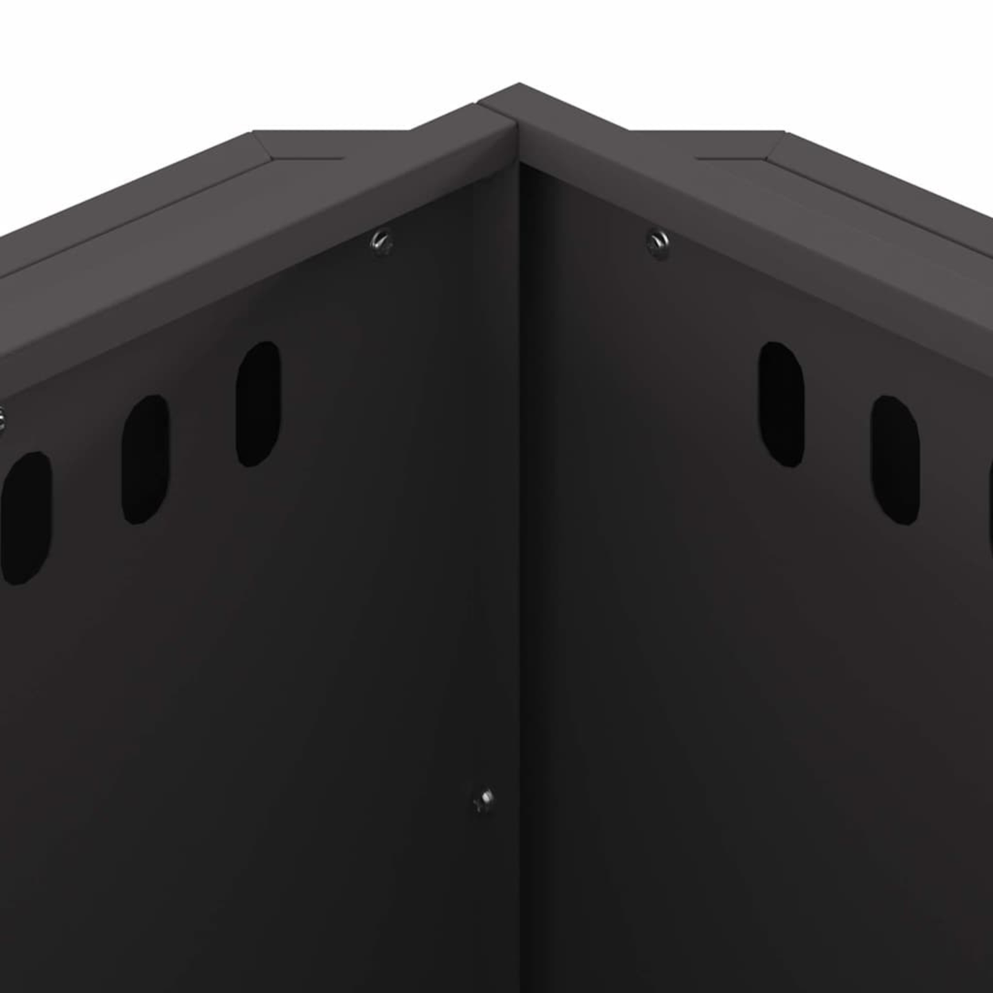 Close up of chamfered corner and oval ventilation slots at base of black steel cube fire pit Pyrova